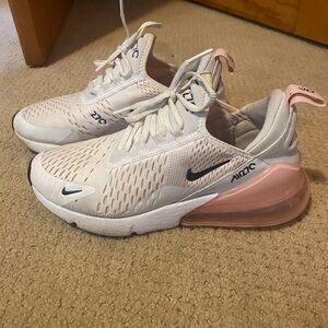 Pink and white Nike air max